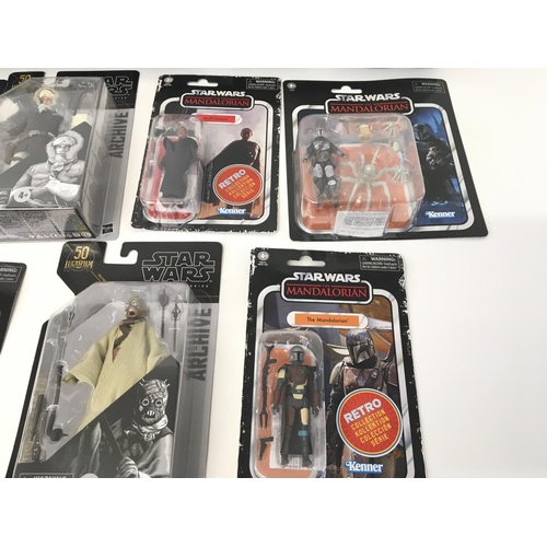 54 - Collection of various Star Wars figures including black series and retro collection.