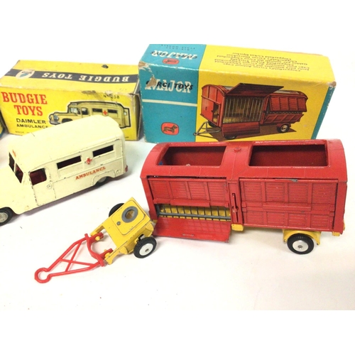 546 - 4 Boxed Vehicles including Dinky Ambulance #263. A Matchbox Racing-Car Transporter #K-9. A Budgie To... 