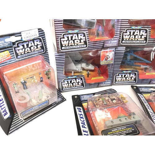 555 - A Box Containing a Collection of Boxed Star Wars Action Fleet Micro Machines.