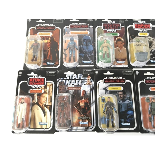 56 - Collection of various carded Star Wars figures including mandalorian and clone wars etc.