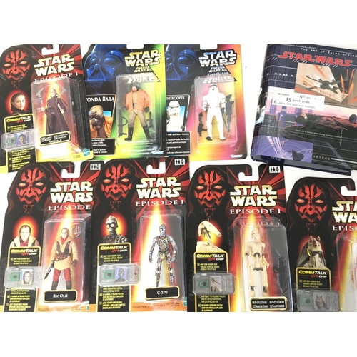 560 - A Collection of Carded Star Wars Episode 1 And Power of the Force Figures and 2 Data Files.