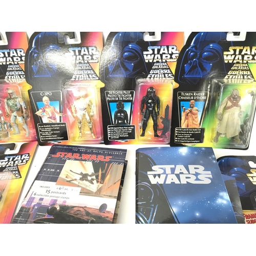 560 - A Collection of Carded Star Wars Episode 1 And Power of the Force Figures and 2 Data Files.