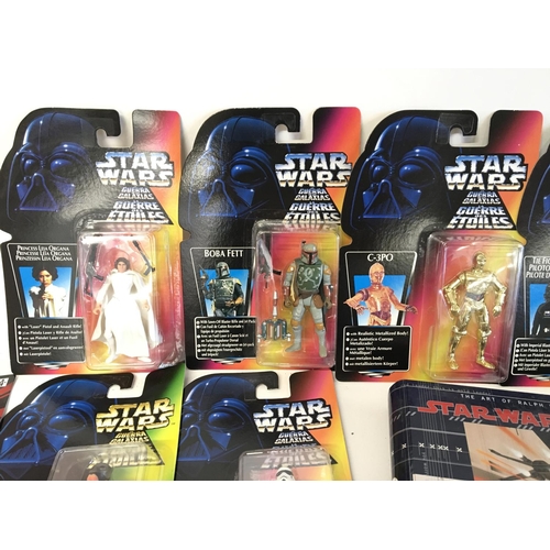 560 - A Collection of Carded Star Wars Episode 1 And Power of the Force Figures and 2 Data Files.