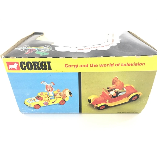 6 - A Boxed Corgi Comics Dick Dastardly Racing Car #809. Window Damaged.
