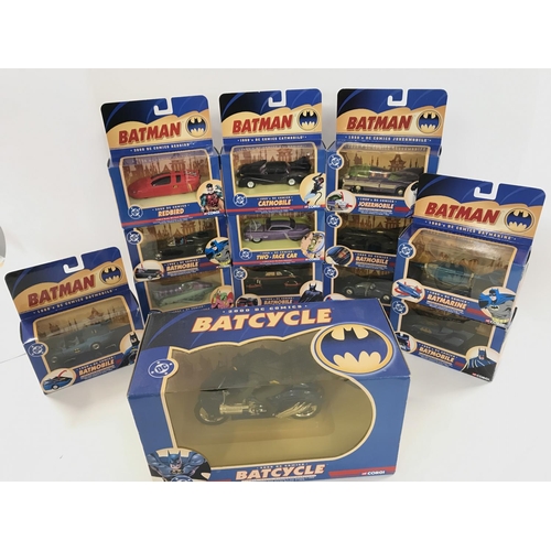 65 - A Collection of Boxed Corgi Batman Vehicles including a Batcycle.