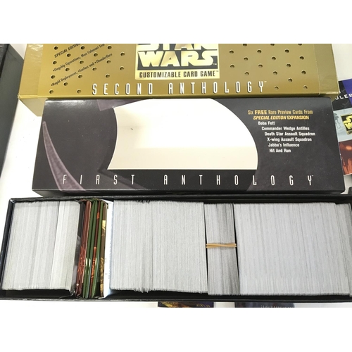 653 - A Collection Various Star Wars Card Games Etc. Some sealed.