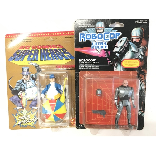 654 - A Carded Toy Biz D C Comics Penguin.a Kenner RoboCop and 2 Ertl Batman Figures.