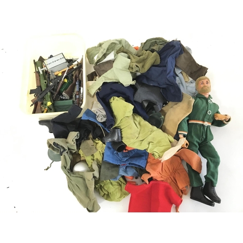 675 - A Collection of Vintage Action Man Uniform.Guns and 1 X Action Man. Ideal for spare Parts.(2).