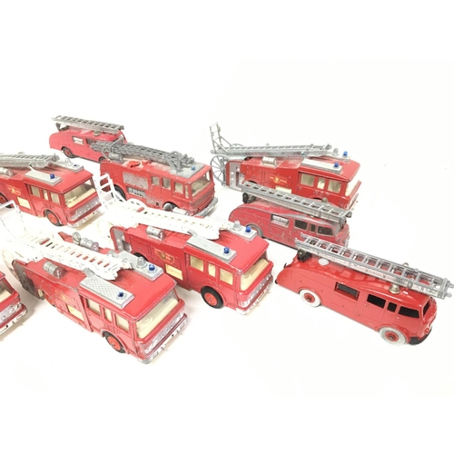 701 - A Collection of Playworn Dinky Fire Engines.