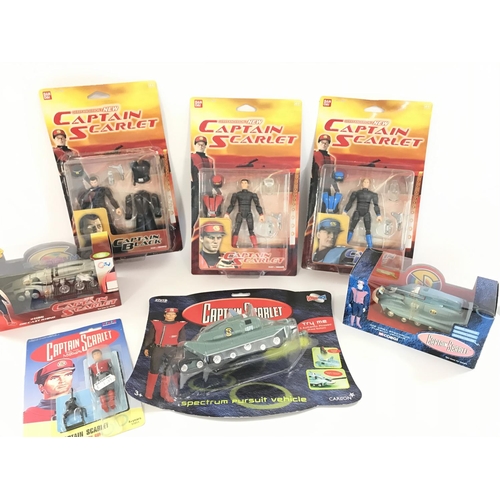 71 - A Collection of Various Boxed Captain Scarlet Figures and Vehicles including Corgi.