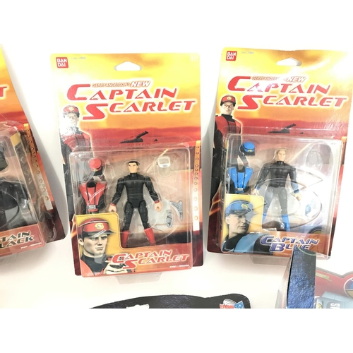 71 - A Collection of Various Boxed Captain Scarlet Figures and Vehicles including Corgi.