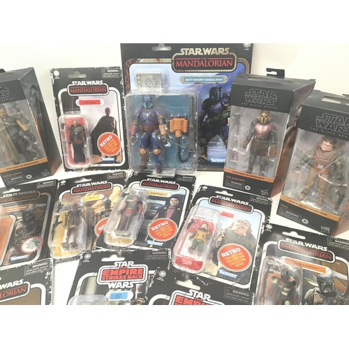 711 - A Box Containing a Collection of Star Wars Black Series and Retro Figures.