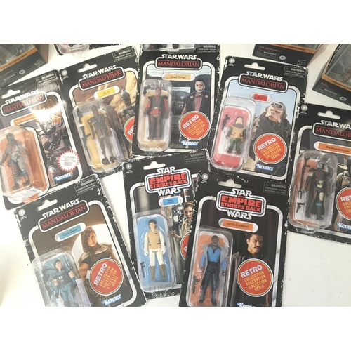 711 - A Box Containing a Collection of Star Wars Black Series and Retro Figures.