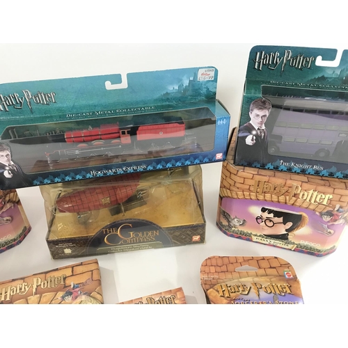73 - A Box Containing a Collection of Boxed Harry Potter And the Golders Compass Itmes.