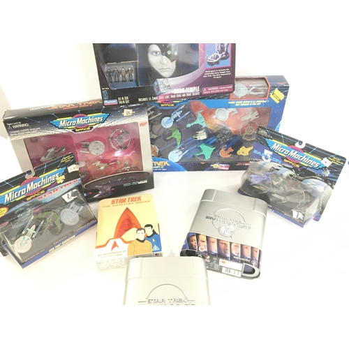 78 - A Collection of Boxed Star Trek Micro Machines and DVDs.