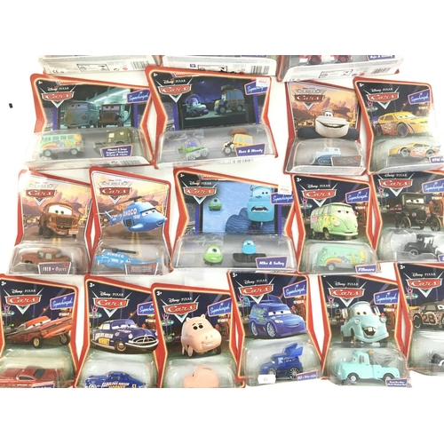 79 - A Large Collection of Pixar/Disney Carded Cars by Mattel.