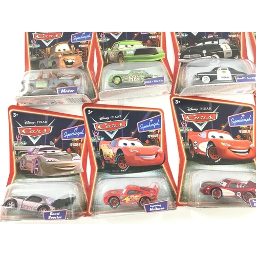 79 - A Large Collection of Pixar/Disney Carded Cars by Mattel.