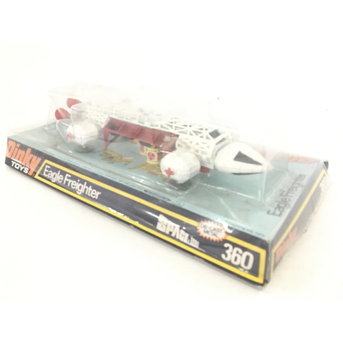 8 - A Boxed Dinky Toys Eagle Freighter #360 Box is worn.