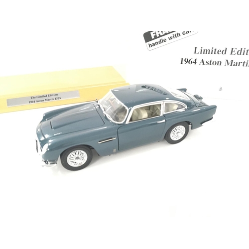 82 - A Boxed Danbury Mint Limited Edition 1964 Aston Martin DB5 With Display Case.(2).