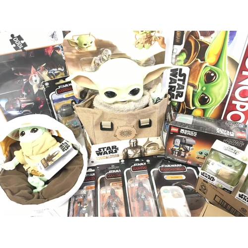 863 - A Collection of Star Wars Toys and Figures Including Monopoly. puzzles. Lego. Soft toys etc.