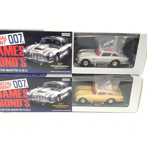 864 - 2 X Corgi James Bond 50th Anniversary Aston Martin D.B.5. Boxed. #04206.