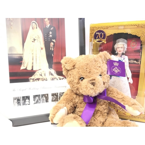 875 - A Queen Elizabeth Barbie Signature Doll. Platinum Jubilee Bear and a Framed Set of Stamps.