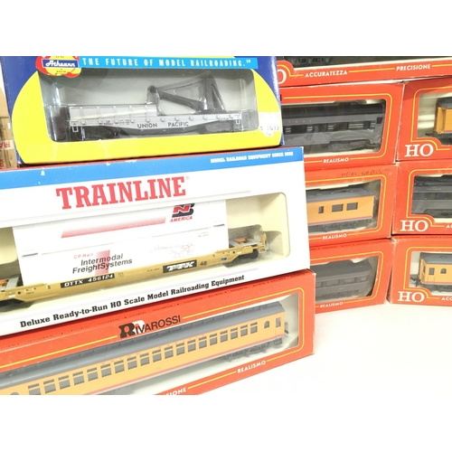 894 - A Collection of Boxed HO Coaches and Rolling Stock including Rivarossi and Athearn.