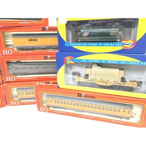 894 - A Collection of Boxed HO Coaches and Rolling Stock including Rivarossi and Athearn.