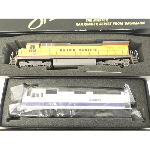 899 - 2 X Boxed Spectrum HO Gauge Locomotives. A Dash 8 40C #85003 and a F40 PH Diesel Locomotive #87025. ... 