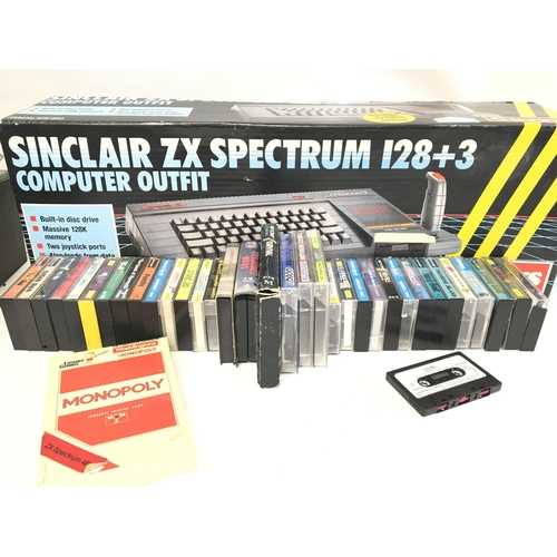 906 - A Boxed Sinclair ZX Spectrum 128+3 and a Collection of Various Games on cassette.