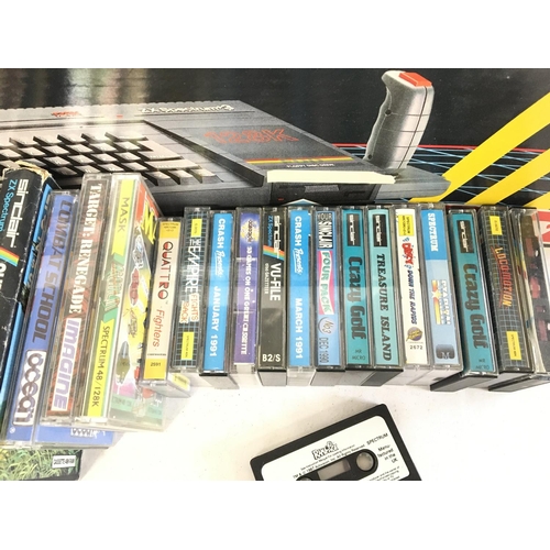 906 - A Boxed Sinclair ZX Spectrum 128+3 and a Collection of Various Games on cassette.