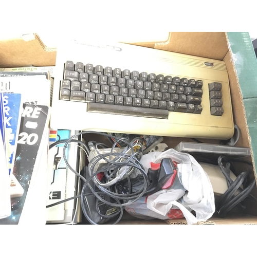 908 - A Commodore VIC 20 plus Accessories and Games.(2).