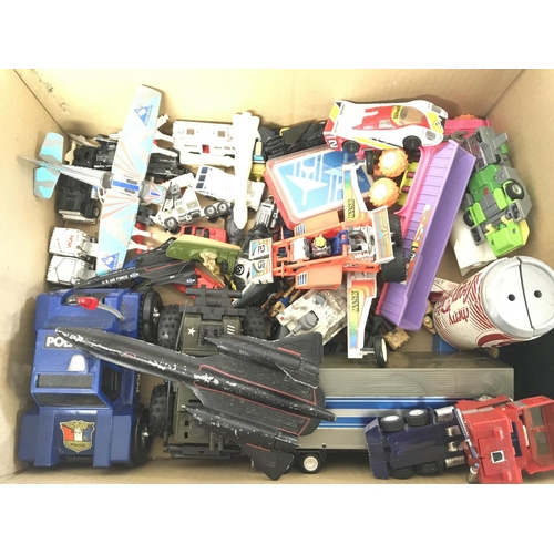 912 - A Box Containing Various Playworn Toys Including Transformers. M..A.S.K. Etc.