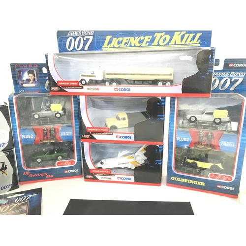 99 - A Collection of Boxed Corgi James Bond Vehicles. A Never Say Never Again Film Cell and playing Cards... 
