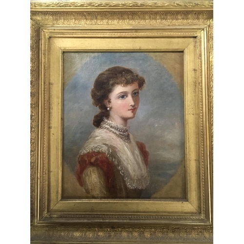 16 - A framed 19th century portrait of a young lady the reverse of the picture with a later applied label... 