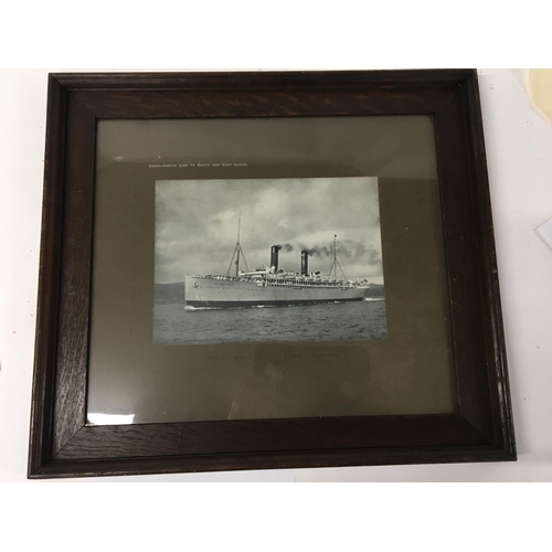 161 - A framed picture of the merchant ship Union Castle Line Royal Mail South and East Africa. In an oak ... 