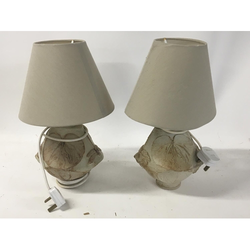 210 - A pair of contemporary ceramic table lamp by Bernard Rooke with raised dragonfly and pond Lilly leav... 