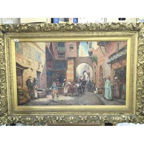 23 - A large and impressive oil painting study of a Middle Eastern street scene  with figures signed and ... 