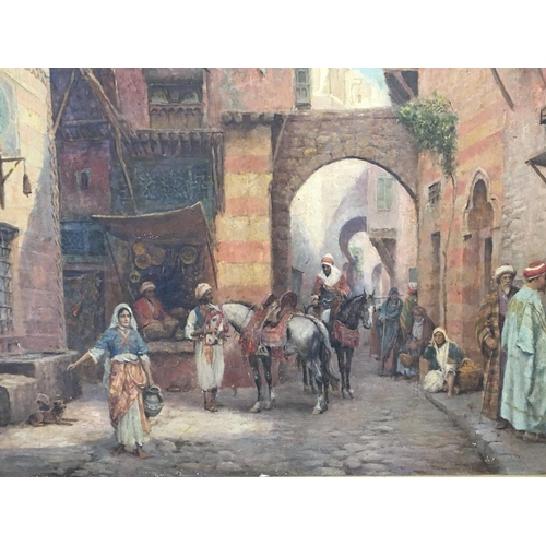 23 - A large and impressive oil painting study of a Middle Eastern street scene  with figures signed and ... 
