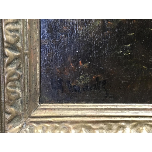 24 - A gilt framed 20th century oil painting study of a figure on a path indistinctly signed the reverse ... 