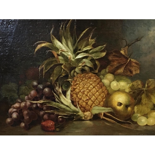 25 - A gilt framed oil painting on canvas still life study with a pineapple and other fruit. In the style... 