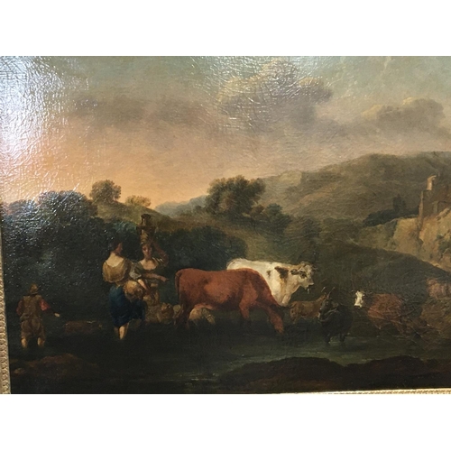 32 - A late 18th or early 19th century oil paintings on canvas depicting cattle and milk maids in a lands... 