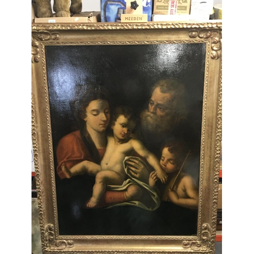 33 - A framed early 18th century oil painting on canvas a study of St John and the Holly mother and child... 