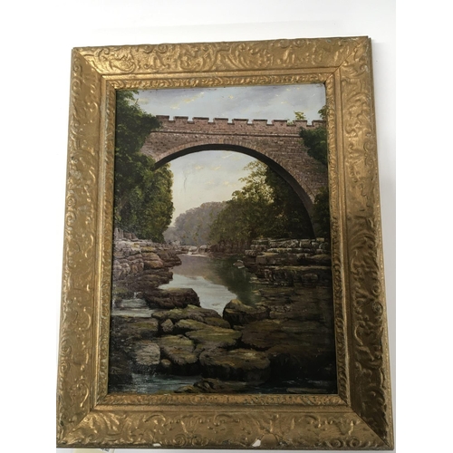 44 - A gilt framed oil painting on canvas study of a bridge over a river unsigned and unattributed. 36x45... 