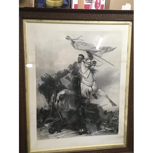 97 - A large framed engraving cavalry battle scene Fight for the standard. In a carved frame. 89x107cm