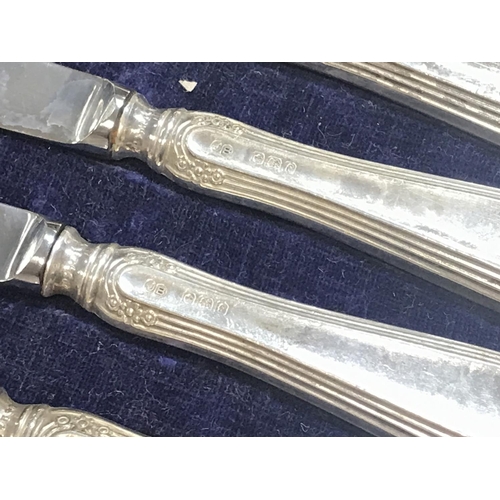 845 - Cased silver hallmarked Sheffield made butter knives , postage cat B