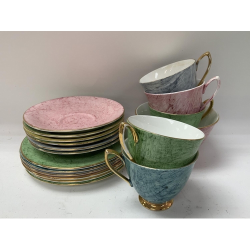 1106 - A collection of mixed ceramics to include a Wedgwood green glazed teaset, Paragon Belinda pattern te... 