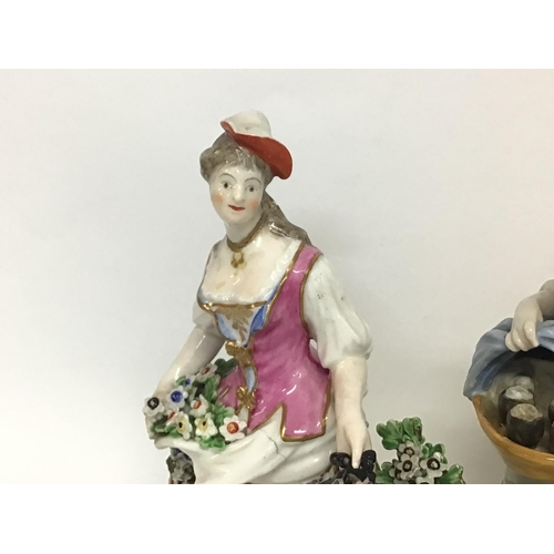 1117 - Porcelain figures of two ladies, unmarked. Approximately 24cm tall. Postage cat D