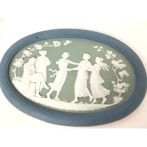 1129 - An early Wedgwood blue green plaque & a Royal Doulton floral over grey vase, approximately 22cm tall... 