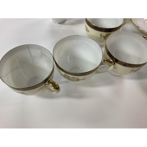 1132 - A Noritake tea set. There is damage to three of the cups and clips on 2 saucers see last picture. Po... 